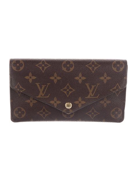 LV Monogram Coated Canvas Jeanne Wallet .